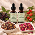 Berry & Blossom Bundle: Black Elderberry and Rosehips tinctures with Hibiscus Heaven Tea and Pink Rose Petals in separate dishes.