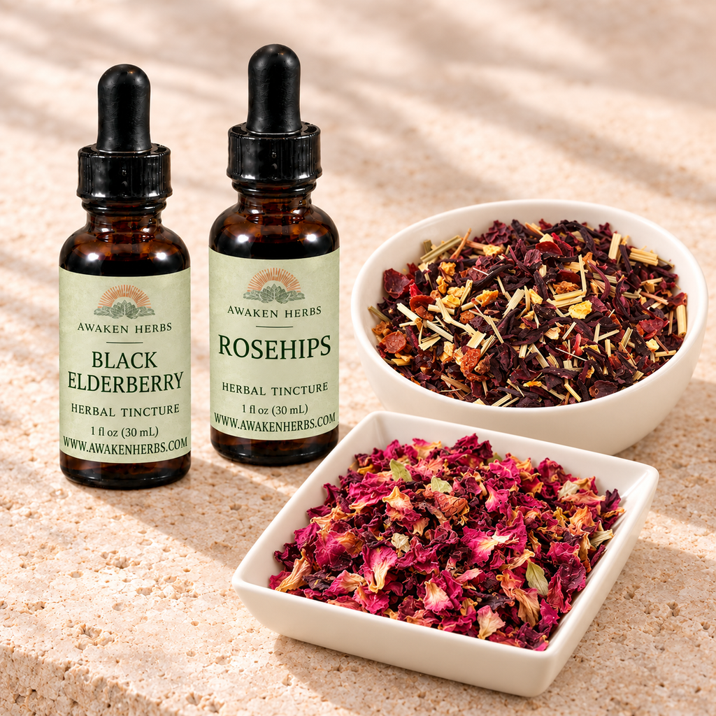 Berry & Blossom Bundle: two labeled 1 fl oz tincture bottles with a bowl of hibiscus tea and a dish of dried rose petals.
